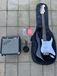 Squier Stratocaster Electric Guitar Pack Black W/ Frontman 10G Amp, Accessories Used. Price: $250.00.