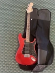 Fender Squier Stratocaster - Torino Red W/ Gig Bag. Used. Price: $200.00.