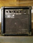 Rogue G10 10W Guitar Combo Amp Mic Input,, Headphones Out,, Bass And Treble Cont Used. Price: $25.00.