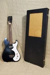 Silvertone 1965 Model 1457 Black Sparkle Guitar W/amp-in-case All. Original Used. Price: $975.00.