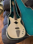 Vintage Danelectro Guitar Blonde 1960 Convertible With Original Case. Price: $650.00.