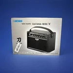 Boss Katana-mini 10-WATT 1X5" Digital Modeling Guitar Combo Open. Price: $149.99.