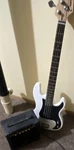 Crescent 4-STRING Solid Body Electric Bass Guitar White Rh 20-FRET W/ CG-15 Amp Used. Price: $120.00.