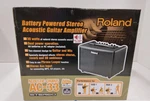 Roland AC-33 Battery Powered Acoustic Guitar Amp Open. Price: $500.00.