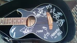 Brownsville Model Acoustic Electric Guitar Sam Ash Band Signing - Right Handed Used. Price: $495.00.