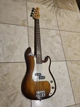 Jay Turser Electric 4 String Guitar Wood Grain And Cream White Used. Price: $144.00.