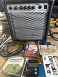 Washburn Lyon LA15B Amplifier With Chord / Guitar Strings & Tuner Used. Price: $60.00.