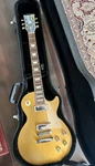 Gibson Les Paul Deluxe Gold Solid Electric Guitar W/ Case Used. Price: $1550.00.