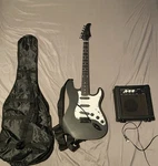 Glarry Electric Guitar Black Solid Body W/gig Bag, Amplifier, Strap Used. Price: $70.00.