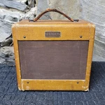 1953 Fender Champ 5C1 "600" Wide Panel 4-WATT 1X6" Guitar Combo Used. Price: $2450.00.