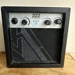 222 By First Compact Portable / Practice Guitar Amplifier AL104 11.2W Cn Used. Price: $12.00.