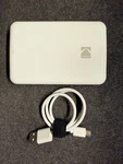 Kodak Step Instant Mobile Photo Printer Model RODMP20 White W/ Usb Cable Tested Used. Price: $48.88.